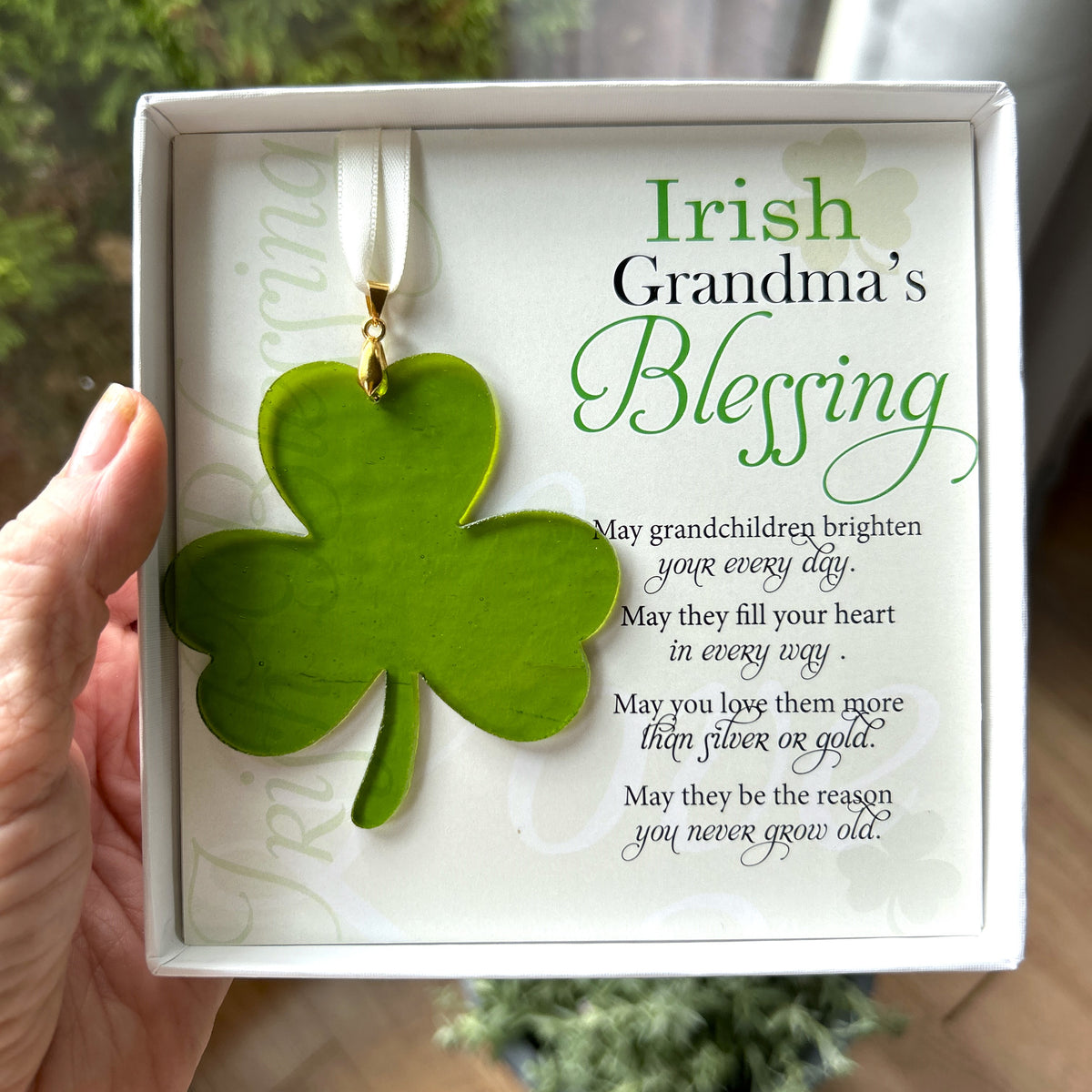 Irish Grandma&#39;s Blessing gift being held in a hand.