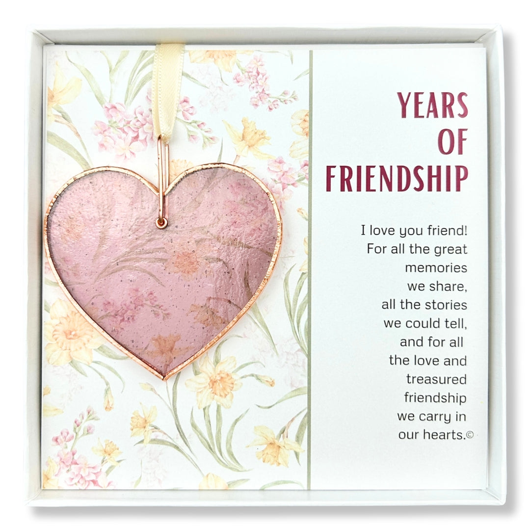 Rose Mauve stained glass heart packaged with &quot;Years of Friendship&quot; Poem in a white box with a clear lid.