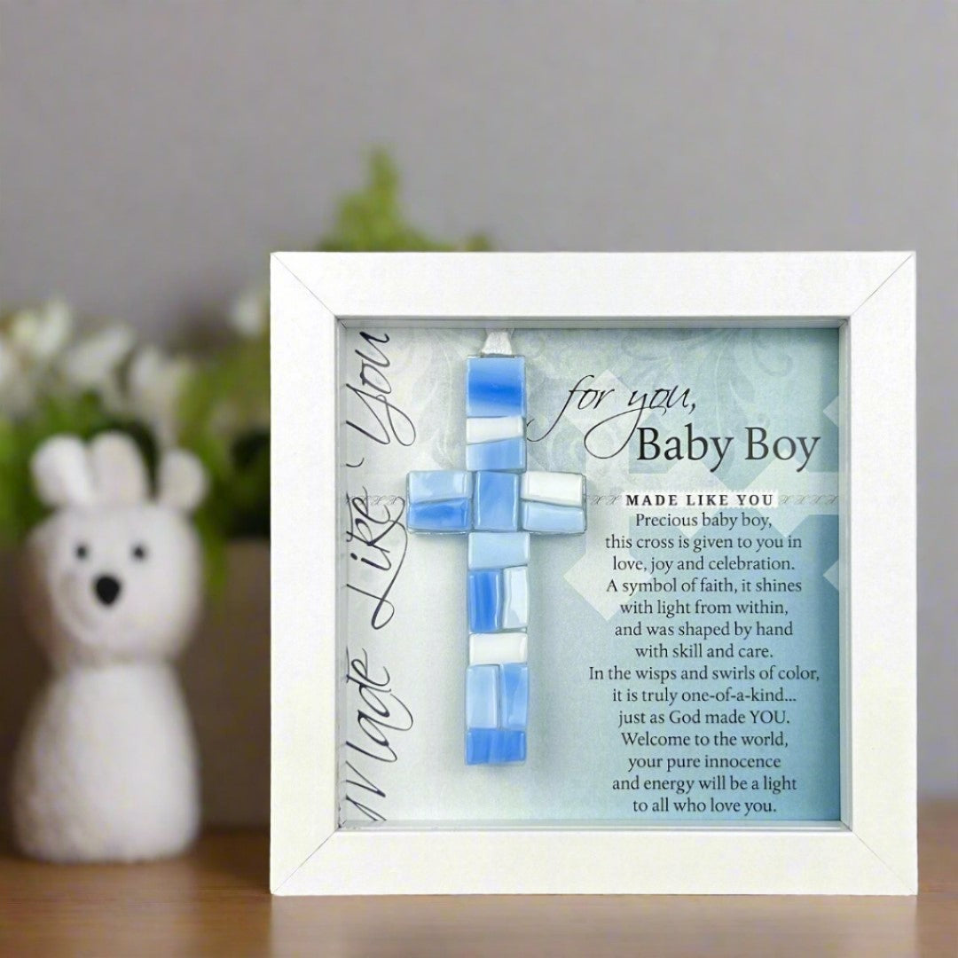 Framed Baby Boy Cross in a nursery.