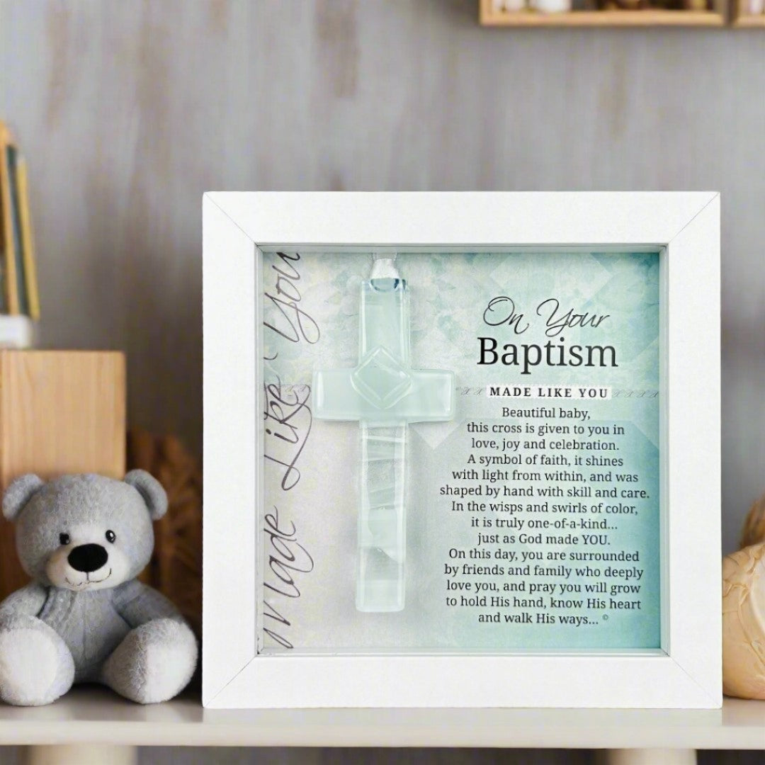 Framed Baptism Cross Gift in a nursery setting.