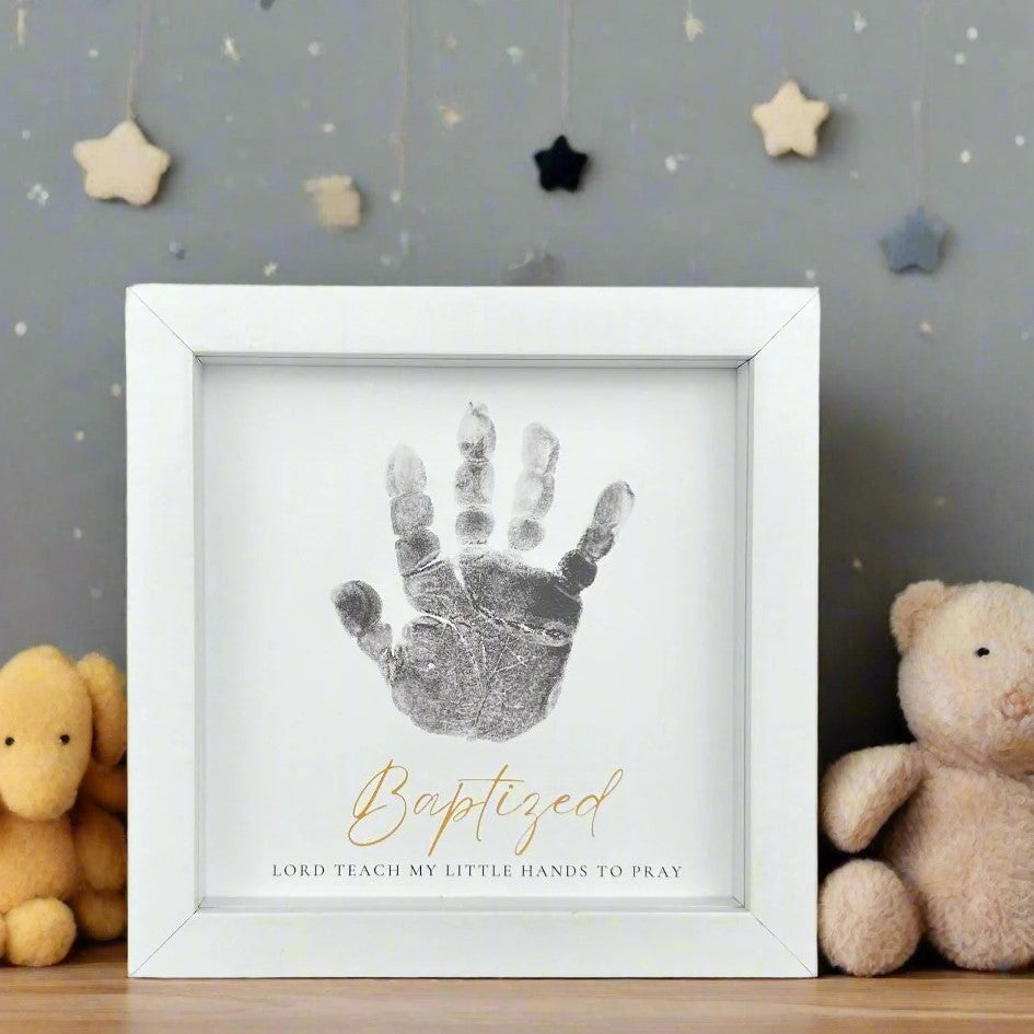 5x5 white frame with &quot;Baptized&quot; Sentiment with space for a child&#39;s handprint.