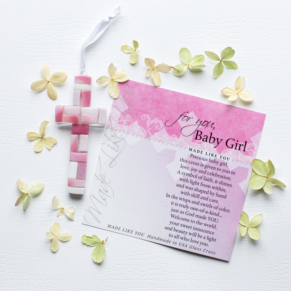 Pink Mosaic cross with shades of pink and white lying next to the For You, Baby Girl sentiment artwork.