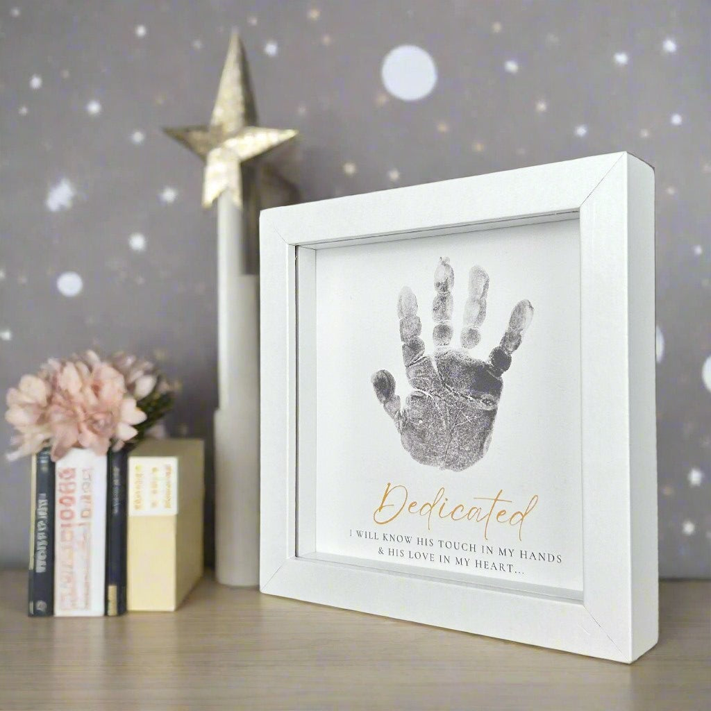 Dedicated handprint frame in a nursery.