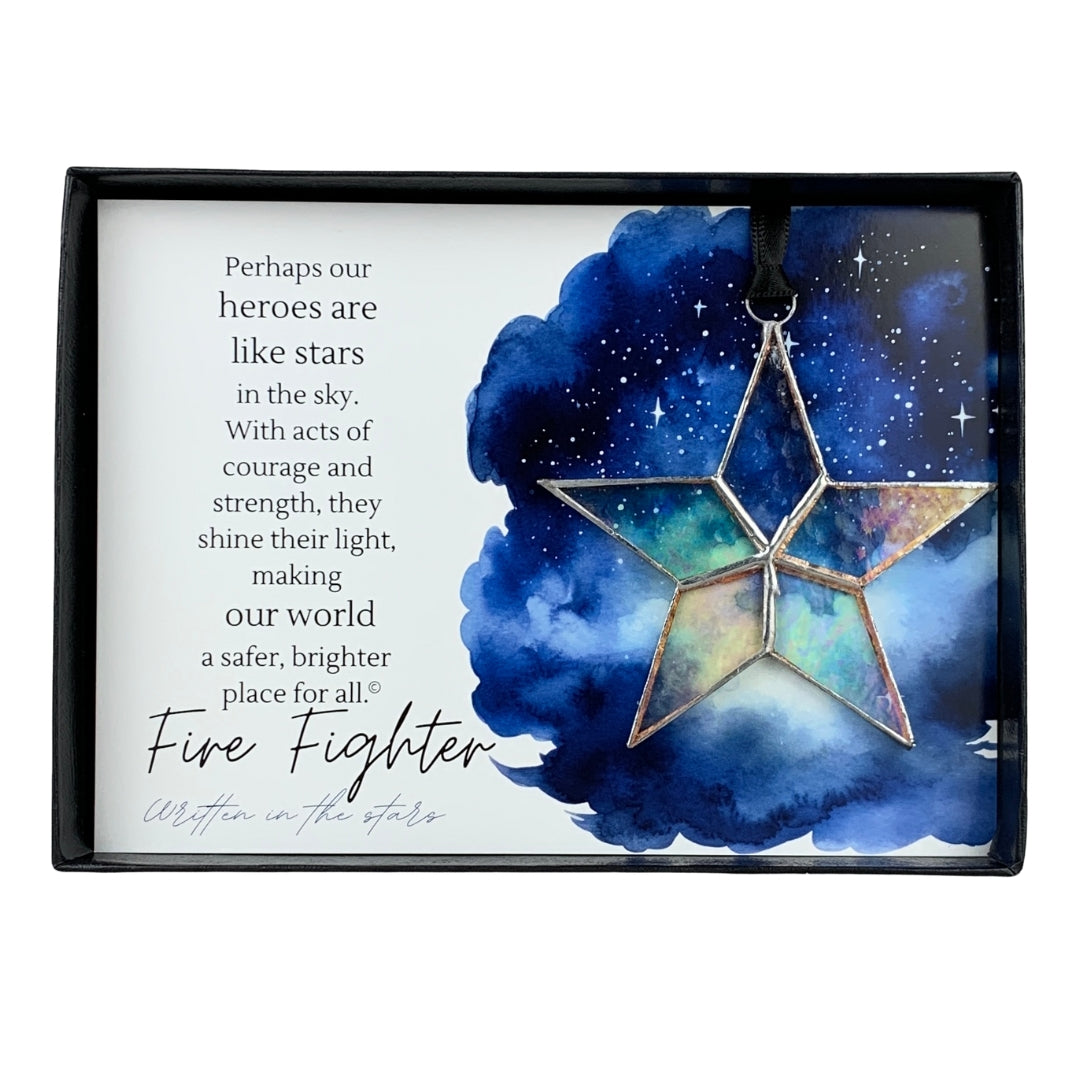 Handmade 4&quot; clear iridescent stained-glass star with silver edging, packaged with &quot;Fire Fighter&quot; sentiment in black gift box with clear lid.