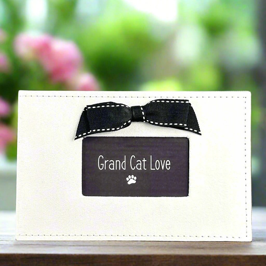 White faux suede photo album with black grosgrain ribbon bow and a window "Grand Cat Love".