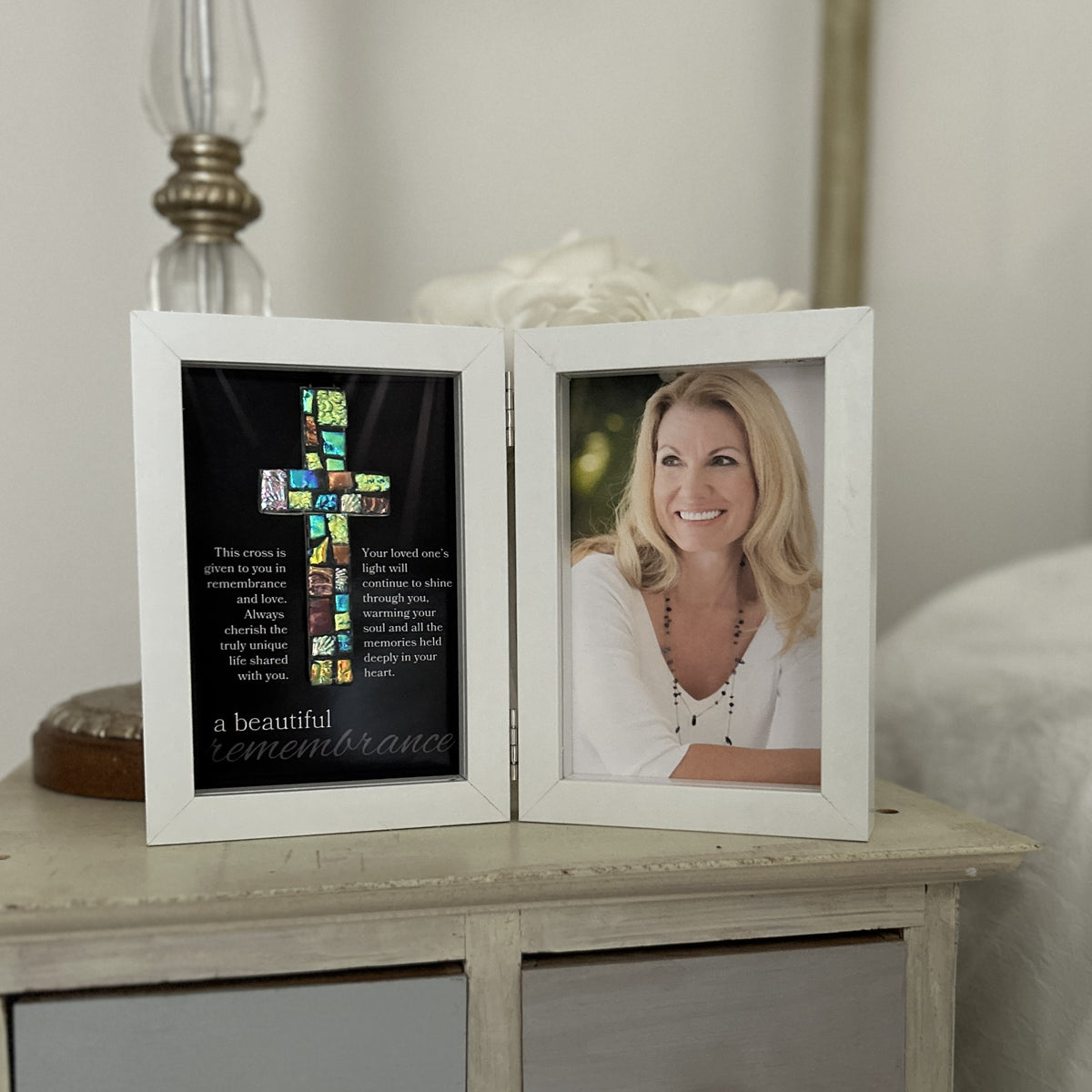 Memorial frame on a nightstand.