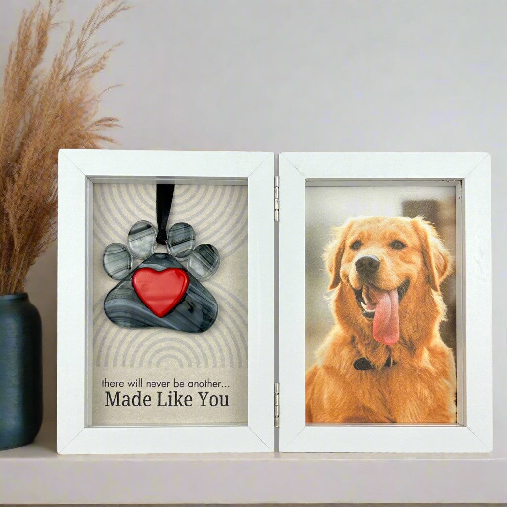 Framed glass pawprint and sentiment.