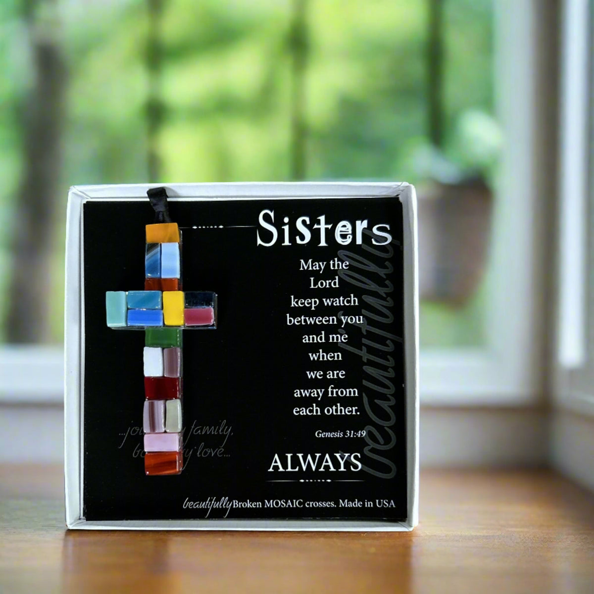 Sisters glass cross and scripture verse.